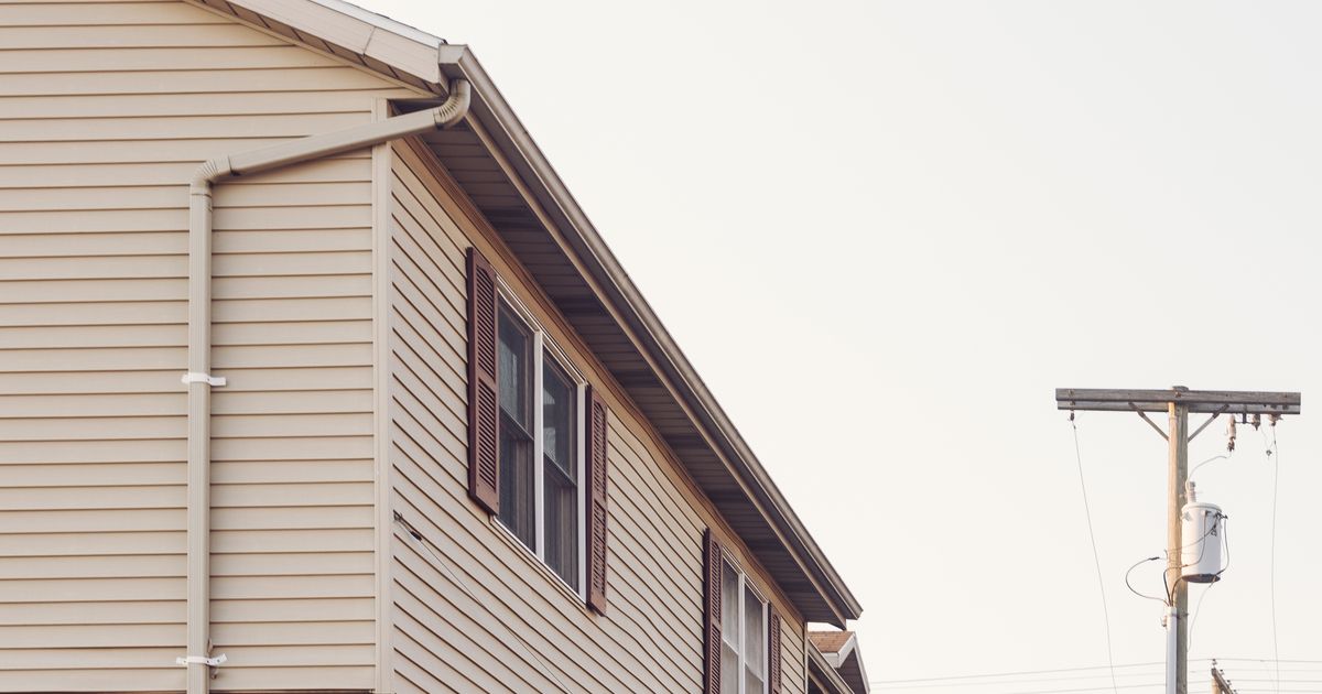 A row of new suburban houses on a quiet street